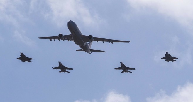 F16s and F35 escorting an RAAF plane