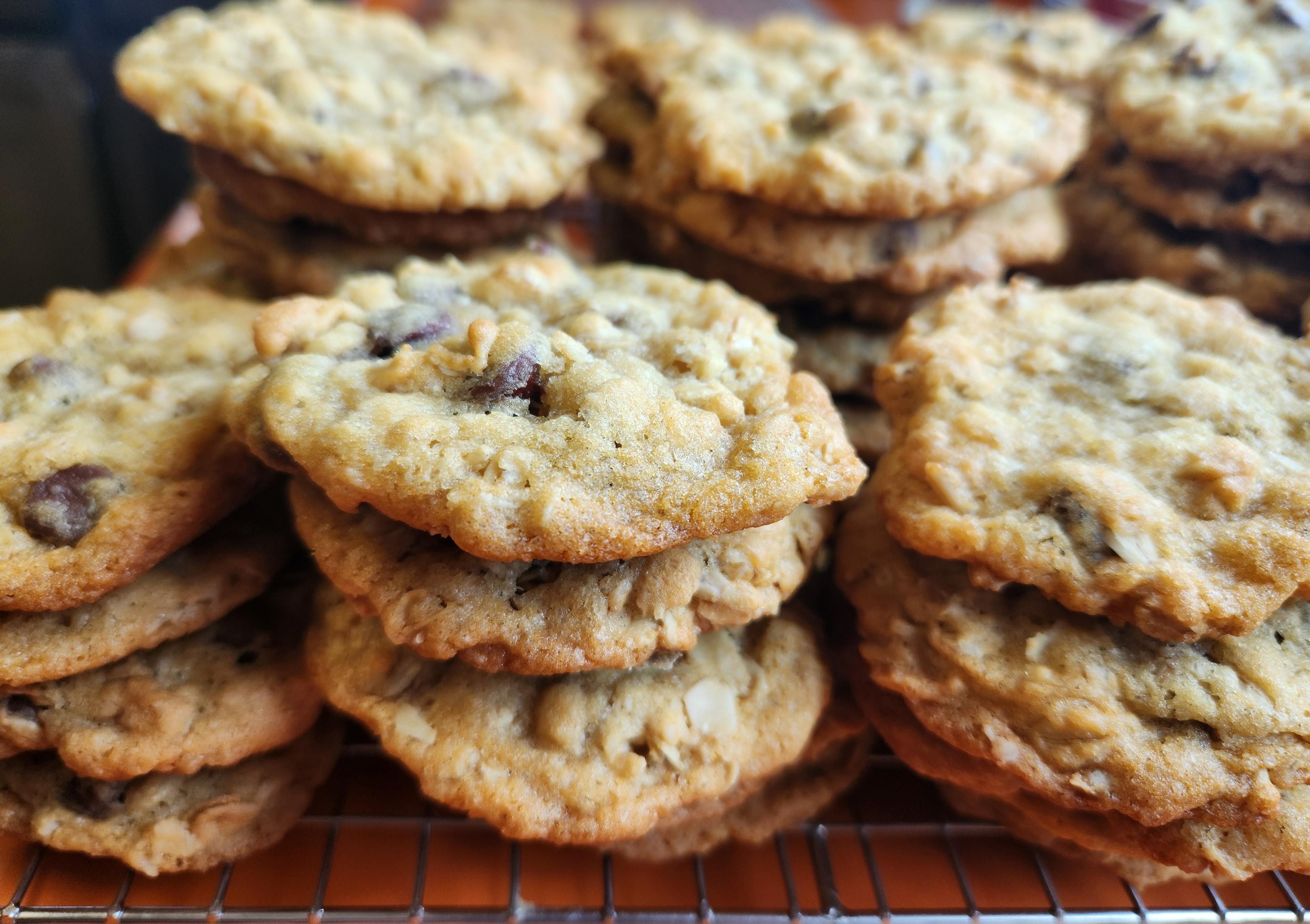 Small stacks of chocolate chip and oatmeal cookies.